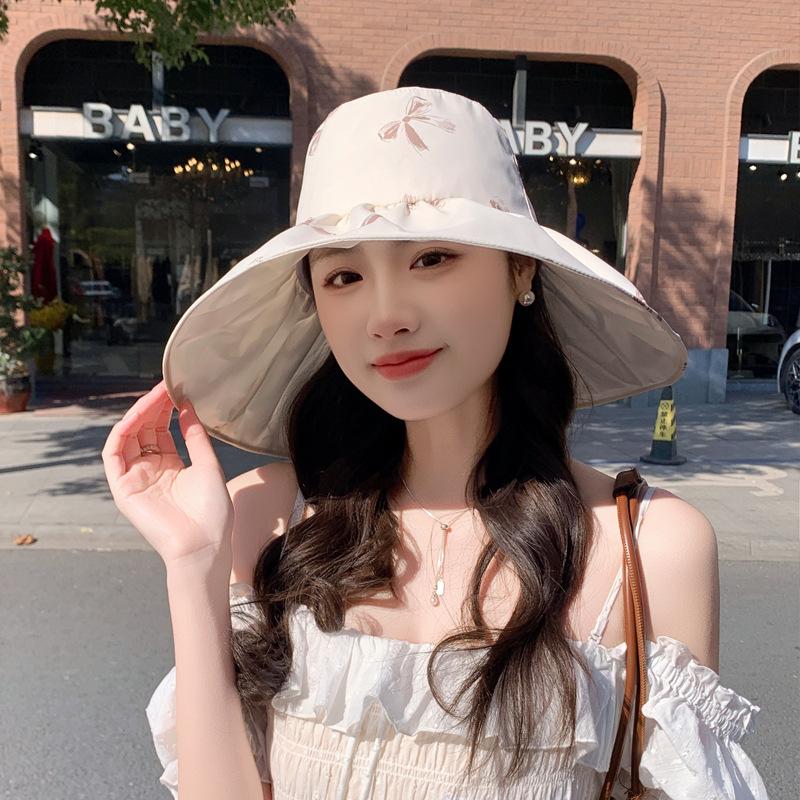 New big edge bucket hat women's summer sunscreen sun hat color glue face cover beach hat foldable bow