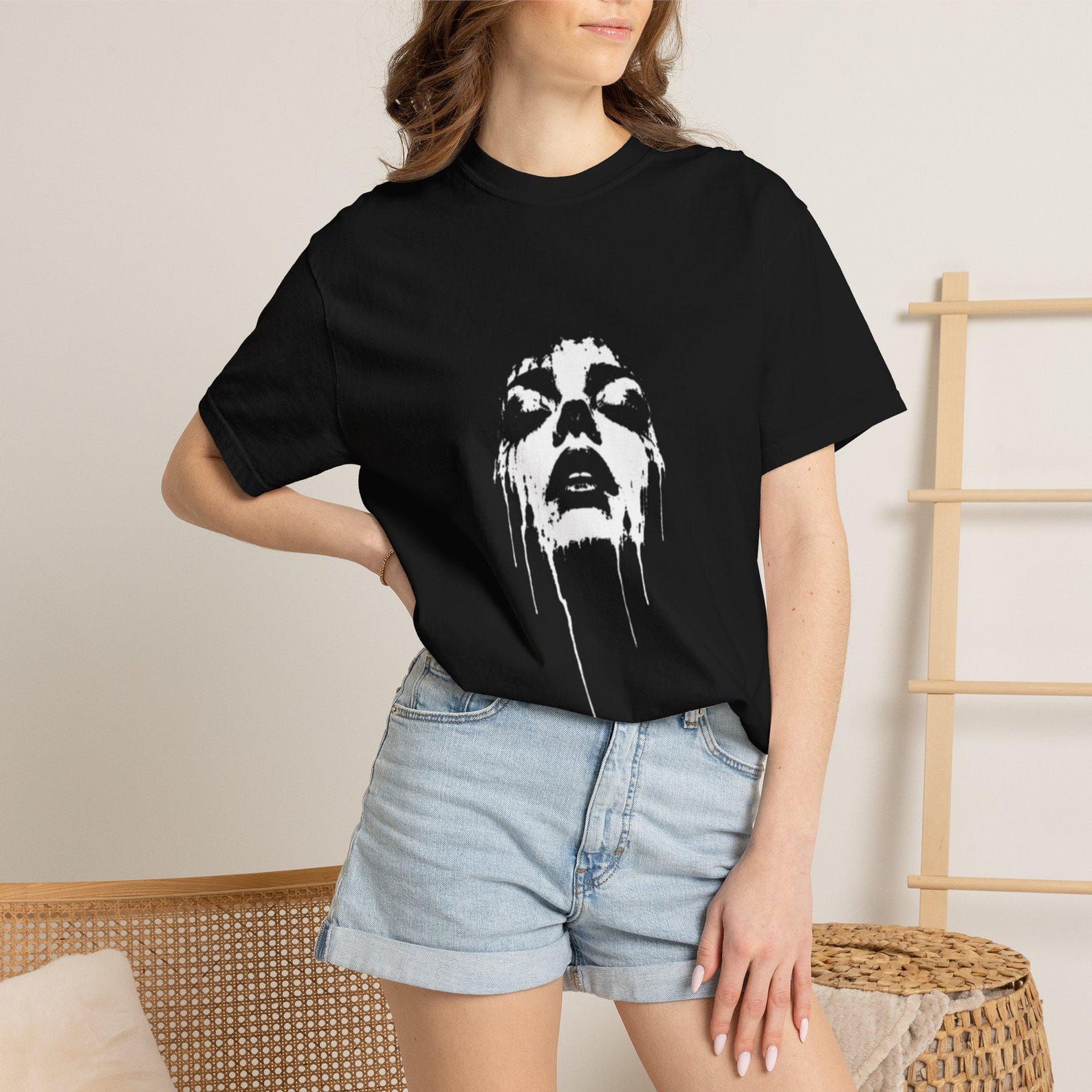 This black t shirt is made for women. S
