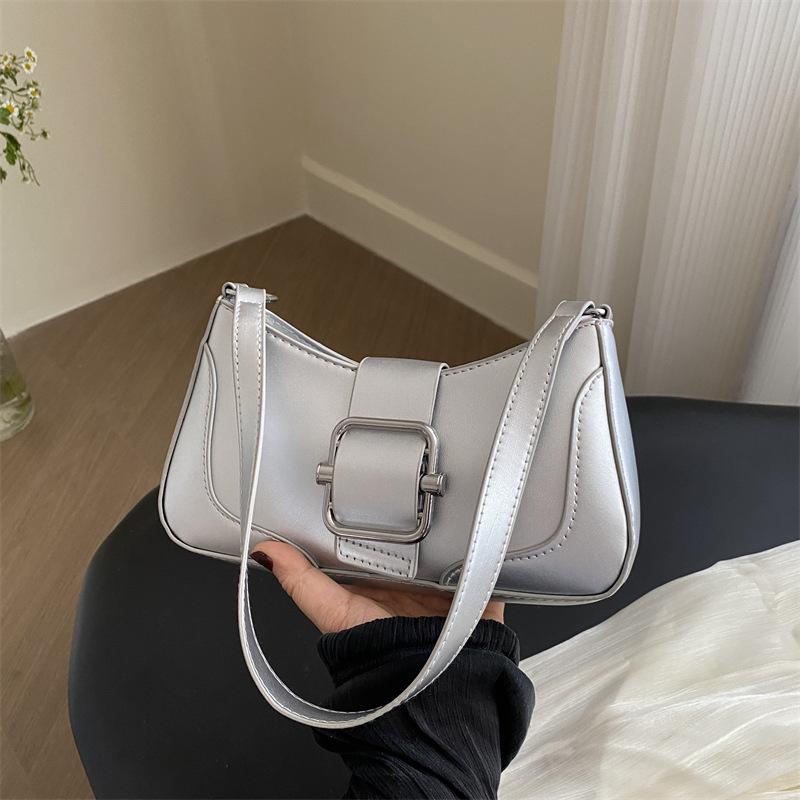 

Retro underarm bag women s 2025 new spring and summer versatile shoulder messenger bag niche design texture popular women s bag серебряный