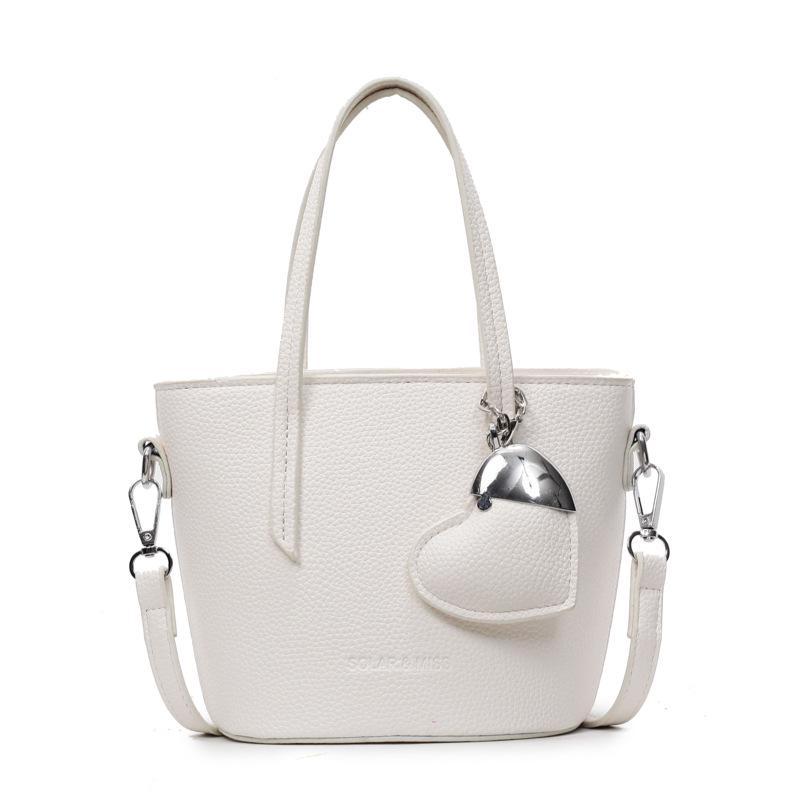 

2025 Женская трендовая сумка-ведро через плечо: Универсальный, Стильный, Простой ручной дизайн слоновая кость/белый