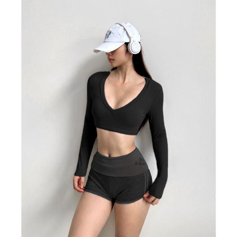 

Йога Красота Вырез на спине Пилатес Наряд с открытым животом Сексуальная футболка с длинными рукавами для тренировок и упражнений Тренировочные короткие топы с нагрудными подушечками Black L