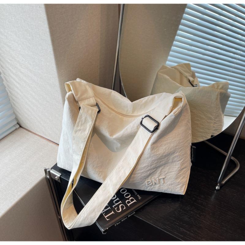 Canvas bag women's large-capacity new summer versatile casual shoulder messenger bag college student tote bag