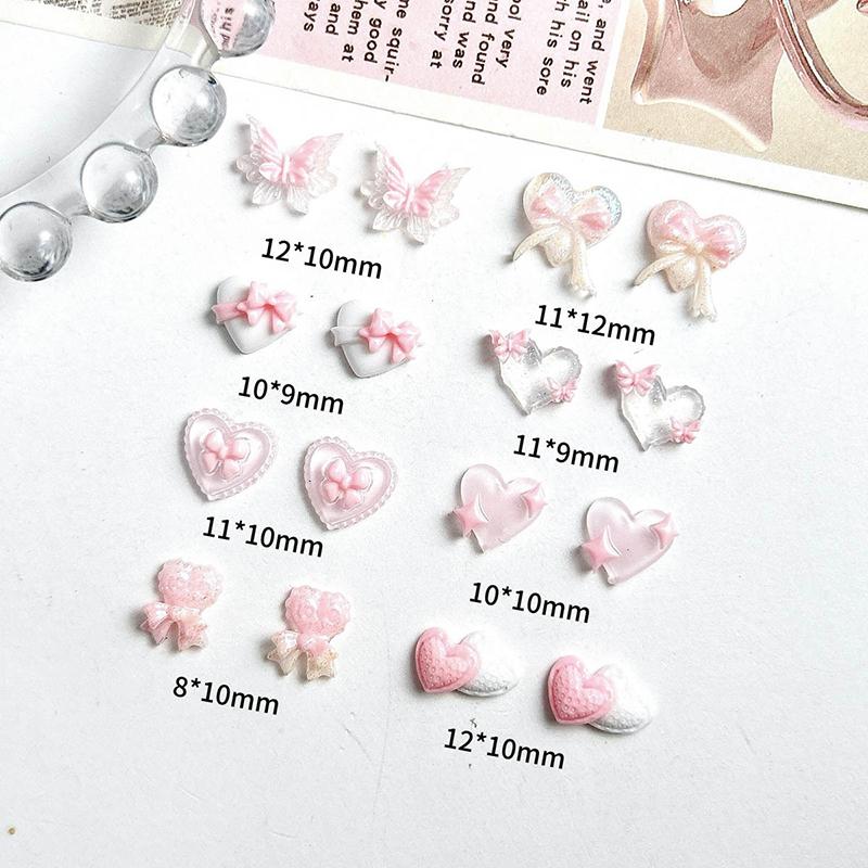 50Pcs Pink Series Bow Heart Resin Nail Charms 3D Luminous Double Butterfly Peach Heart Sweet Wind Nail Art Decorations DIY Nails