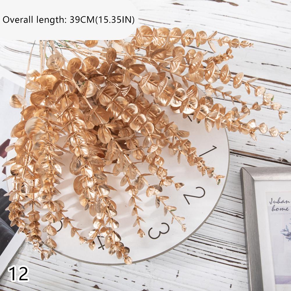 

Золотая серия Пластиковые искусственные цветы Эвкалипт Гинкго Лист Монеты Лист Сердце Трава Свадебный фестиваль Украшения Домашний декор