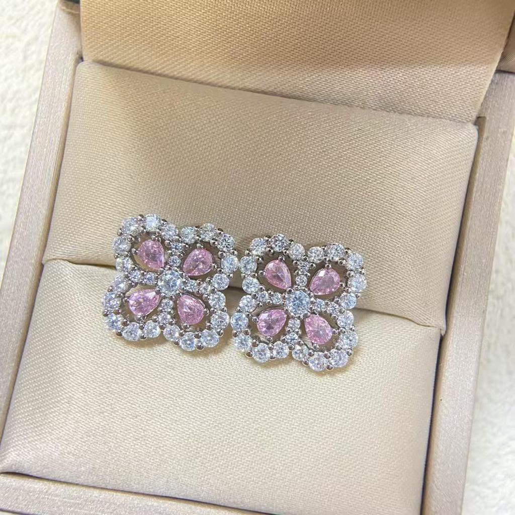 Exquisite Four-Leaf Clover Full Diamond Silver Earrings for Women - Fashionable and Elegant Design.