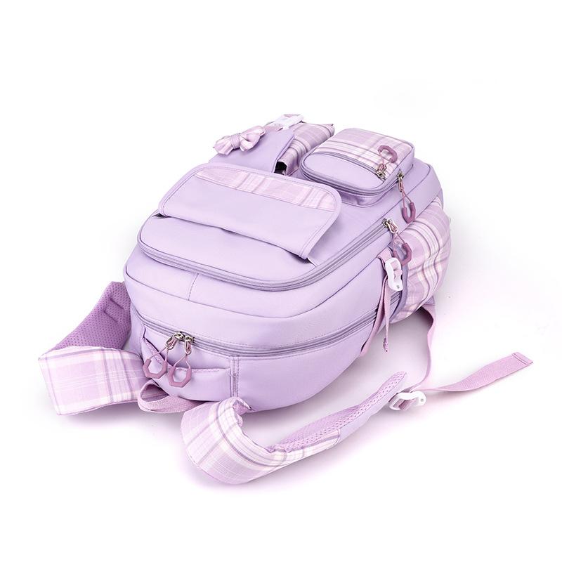 Primary and secondary school school bags Large capacity school bags Children's trend shoulders for grades 3-6