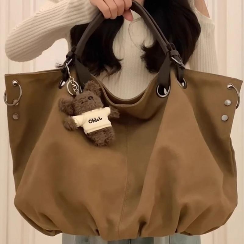 Tote Bag with Large Capacity and Multiple Pockets, for Commuting, with A Single Shoulder Strap and A Slanted Design.