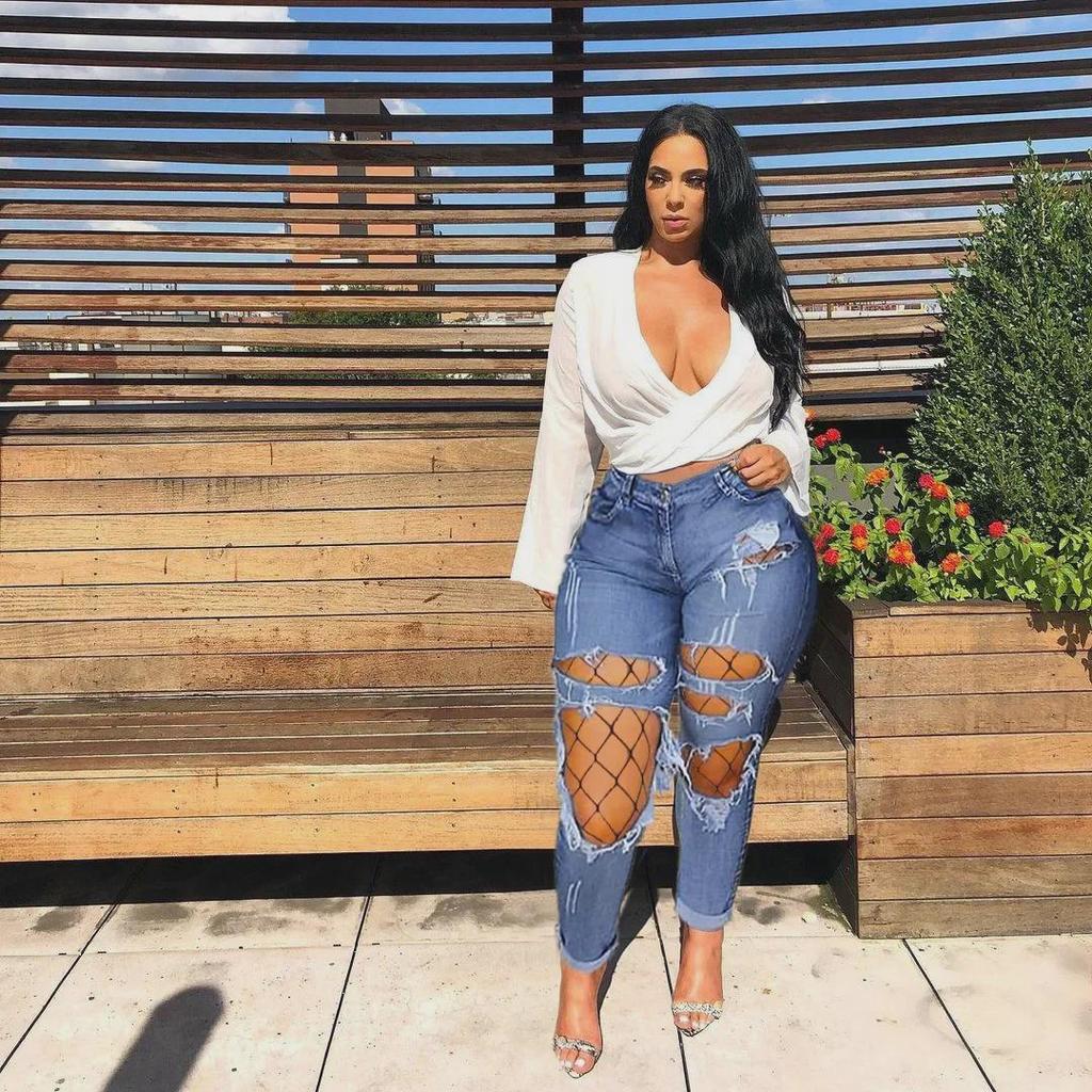 2024 Early Spring European & American Internet Celebrity Casual Ripped Denim Pants with Fishnet Stockings for Women.