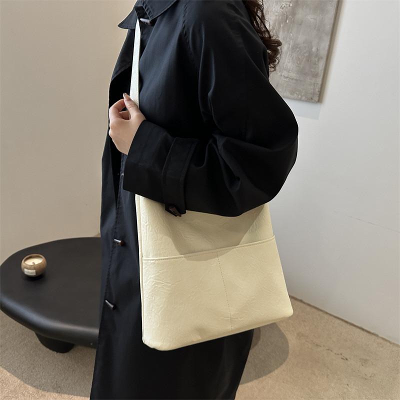 Trendy Casual Pu Tote Bag With Chic Minimalist Style Available In Black Brown Cream Color Perfect For Everyday Outfits