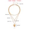 Temperament multi-layer love chain pearl can be opened peach heart pendant necklace female ins wind