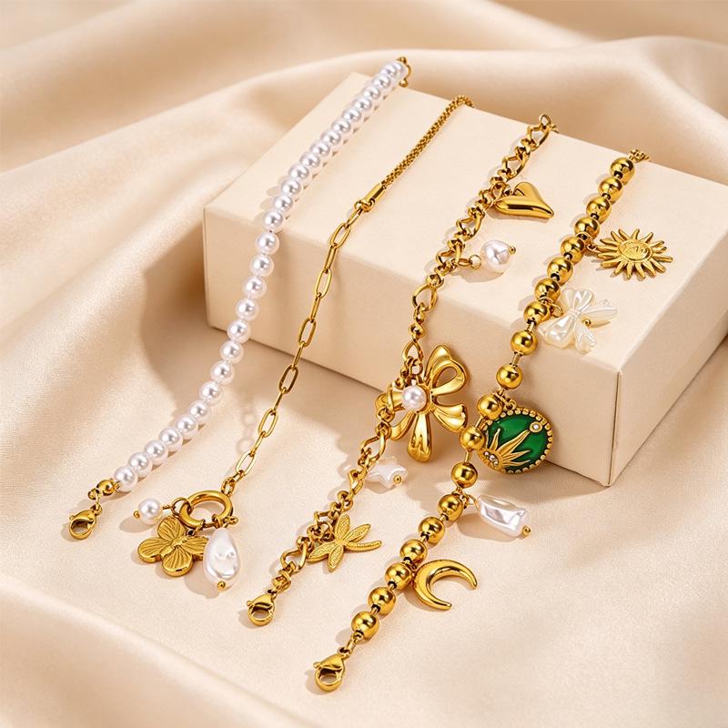 Women's European Retro Multi-Element Titanium Steel Bracelet with 18K Gold Plating and Pearl Accents