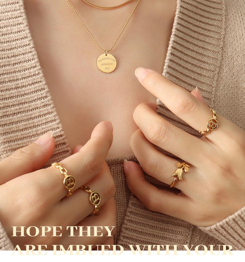 Versatile European American Temperament Hoodie Necklace: English Letter Pendant Double-Layer Gold-Plated Titanium Steel Chain.