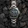 Titoni Pflaumenblüte Meereserkundung Serie Mechanisches Uhrwerk 300 Meter 42mm Schwarzes Zifferblatt Edelstahlgehäuse Edelstahlarmband 83300 S-GN-702