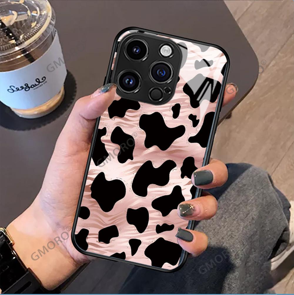 Hot-selling black cow pattern is suitable for iPhone17 light luxury glass protective case, Apple 16 Korean mobile phone case.