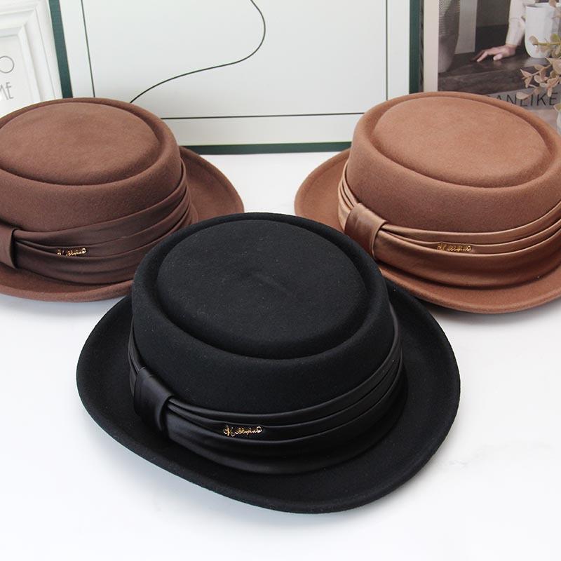 New warped edge wool top hat British retro autumn and winter jazz hat European and American women's short brim fashion versatile hat