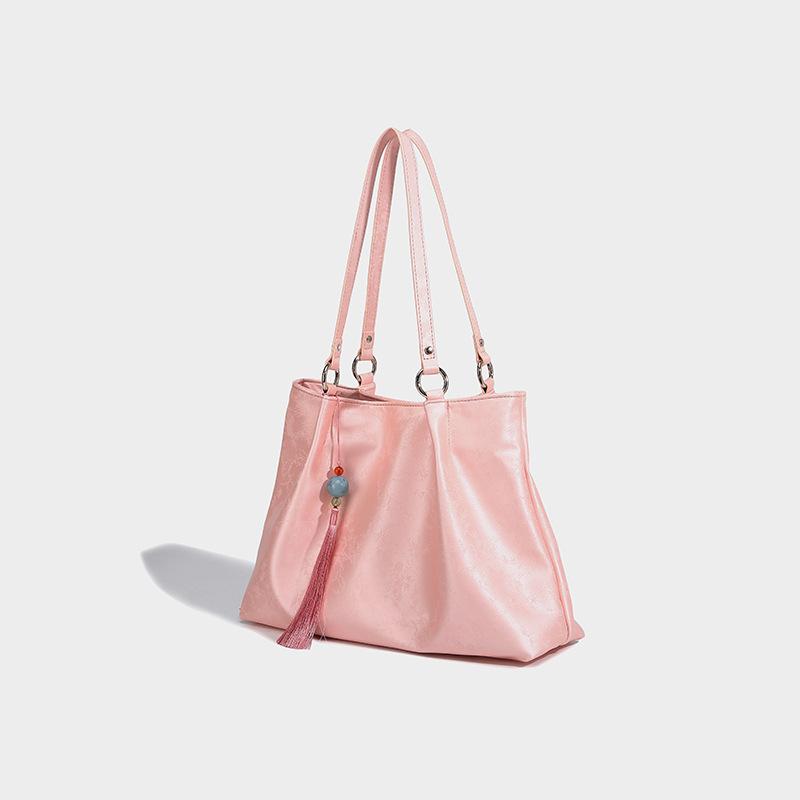 

New wind large-capacity commuter tote bag women s 2024 new high-end fashion versatile shoulder bag розовый