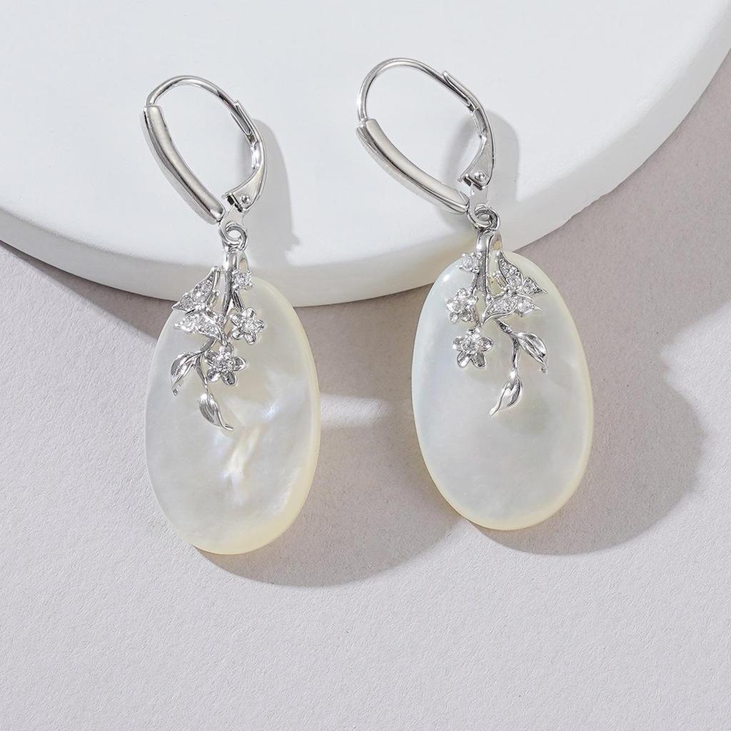 Exquisite Mother-of-Pearl Sterling Silver Luxury Earrings with Unique Face-Inspired Design