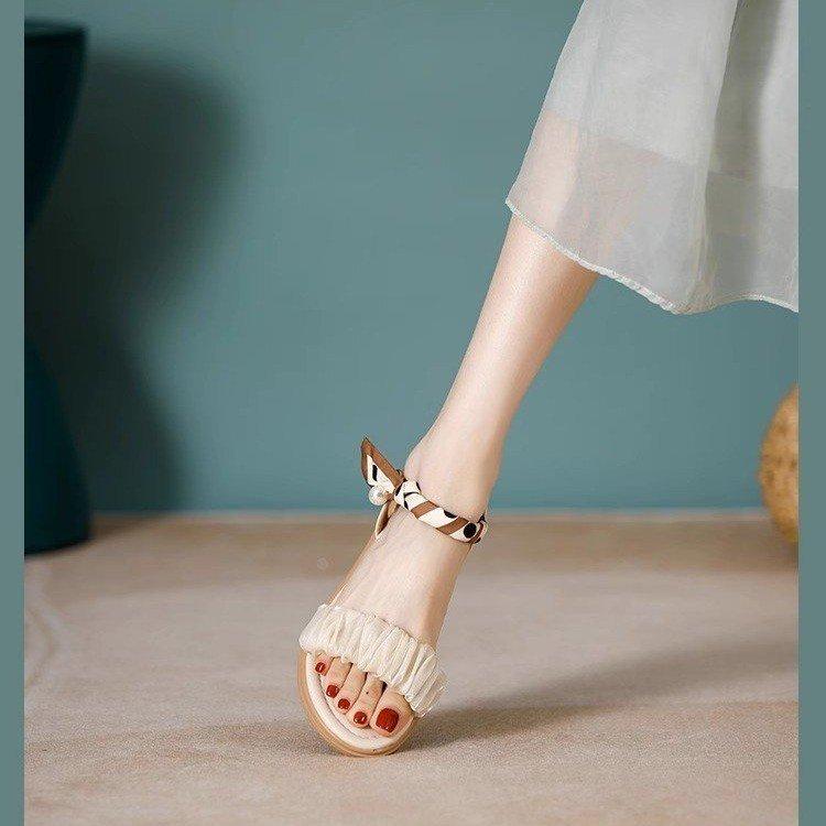 Flat-soled sandals women's new versatile fashion with skirt one-word belt, low-heeled work cool slippers