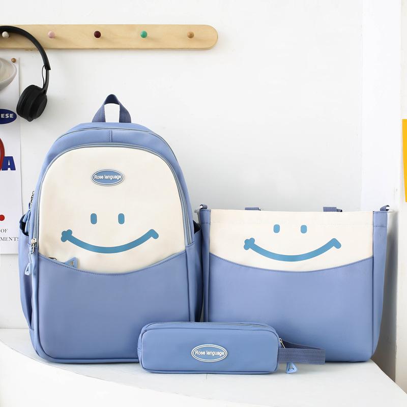 

High-value large-capacity schoolbag, junior high school and high school students contrasting colors smiley face backpack, lightweight backpack синий