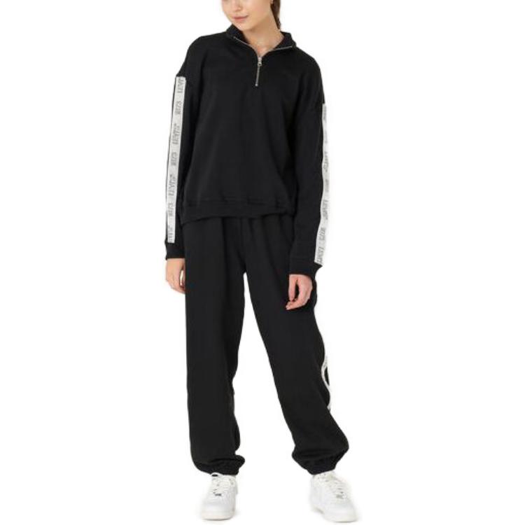 Levis Jednobarevné ohrnuté kalhoty středního pasu volného střihu pro ženy černé A3569-0006