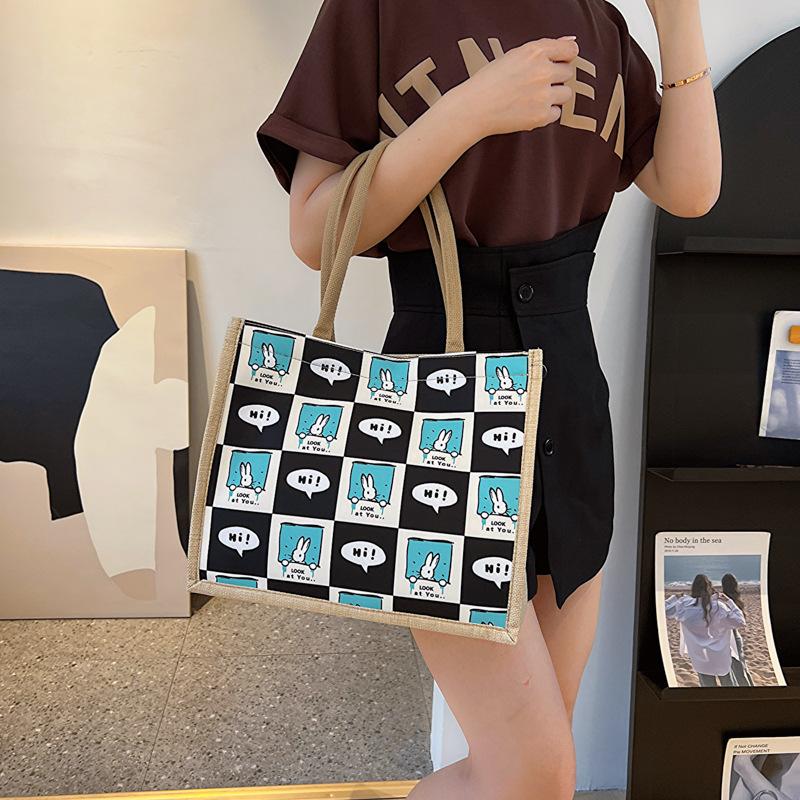 New Printed Large Capacity Fashionable Commuting Women's Bag for College Students In Class One-shoulder Tote Bag Handheld Cotton and Linen Bag Trend