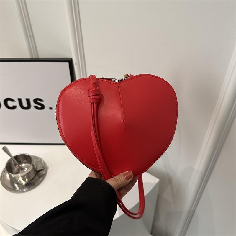 New fashion personality sub-shell love foreign style solid color small peach heart cute personality trendy shoulder messenger women's bag