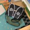 Schoolbag Korean simple foreign style polka dot love rabbit ear backpack 1011 summer new commuter student backpack