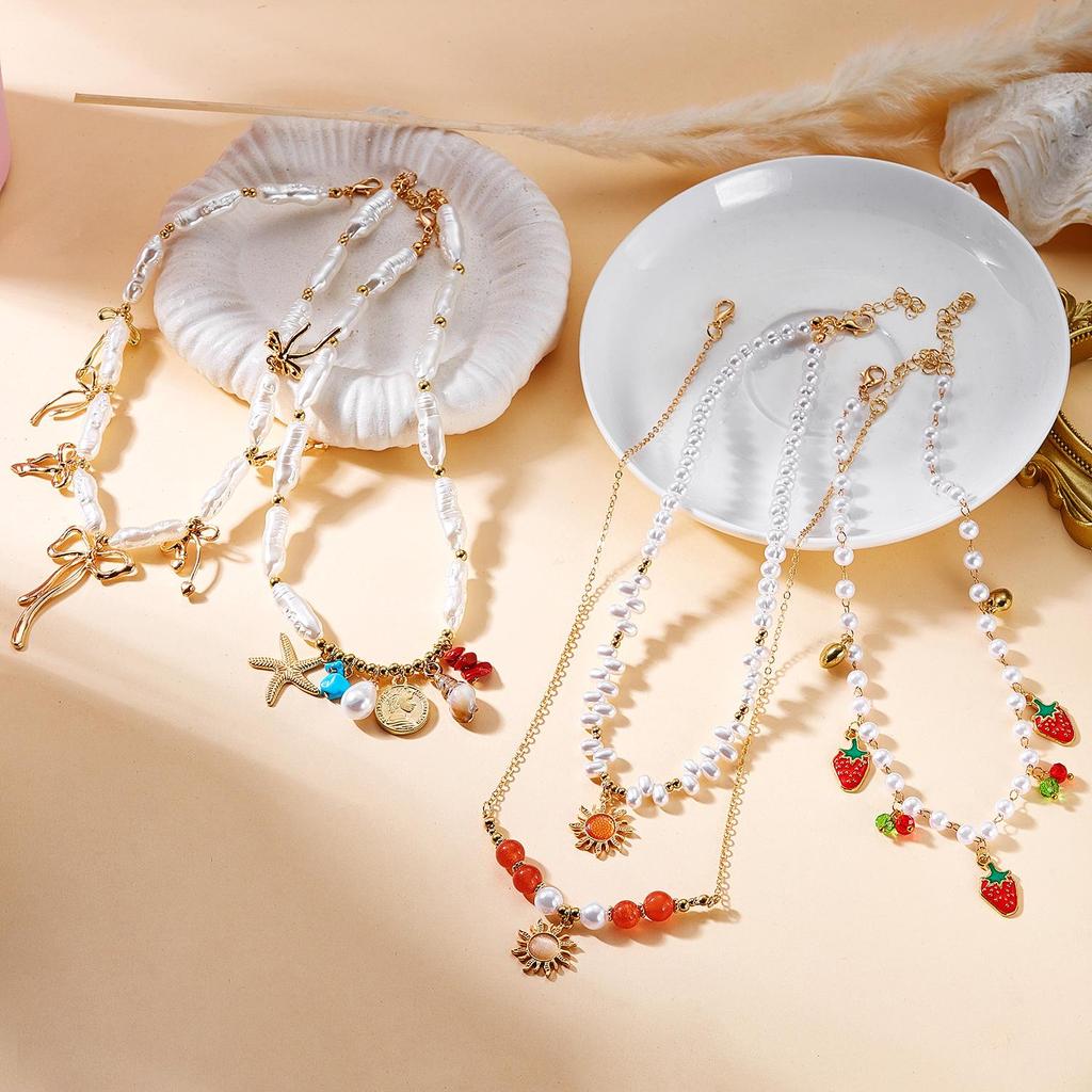 Collana di Perle Barocche Europee e Americane 2026 Inizio Primavera con Ciondoli Stella Marina e Fragola