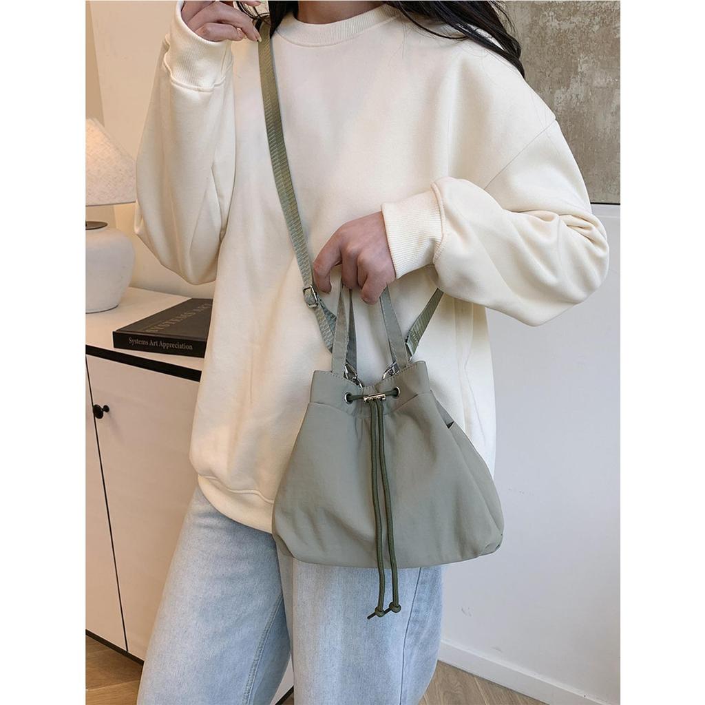 Casual Niche Drawstring Hand-held Bucket Bag Crossbody Bag for Women 2026 New Trendy Versatile Simple Small Bag Cloth Bag