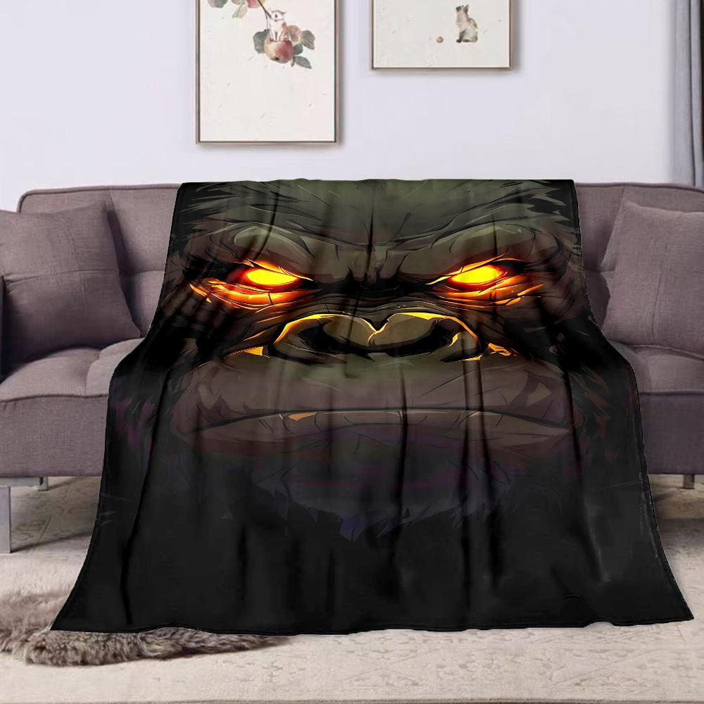 Fierce Glowing-Eyed Gorilla Face Design Patterned flannel blanket perfect for the bedroom living room, sofa, or a little nap