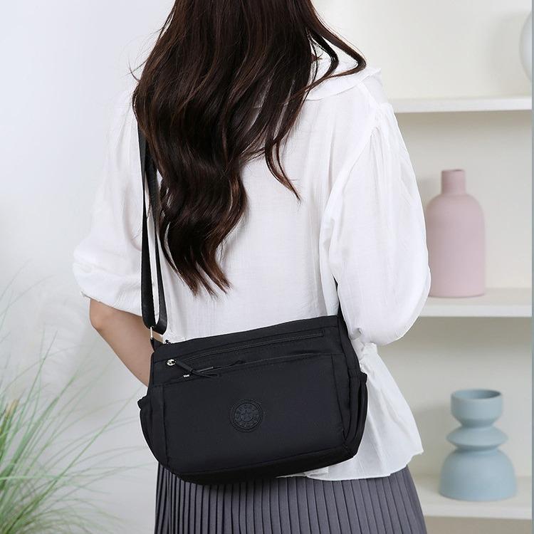 Borsa a tracolla da donna multi-tasche