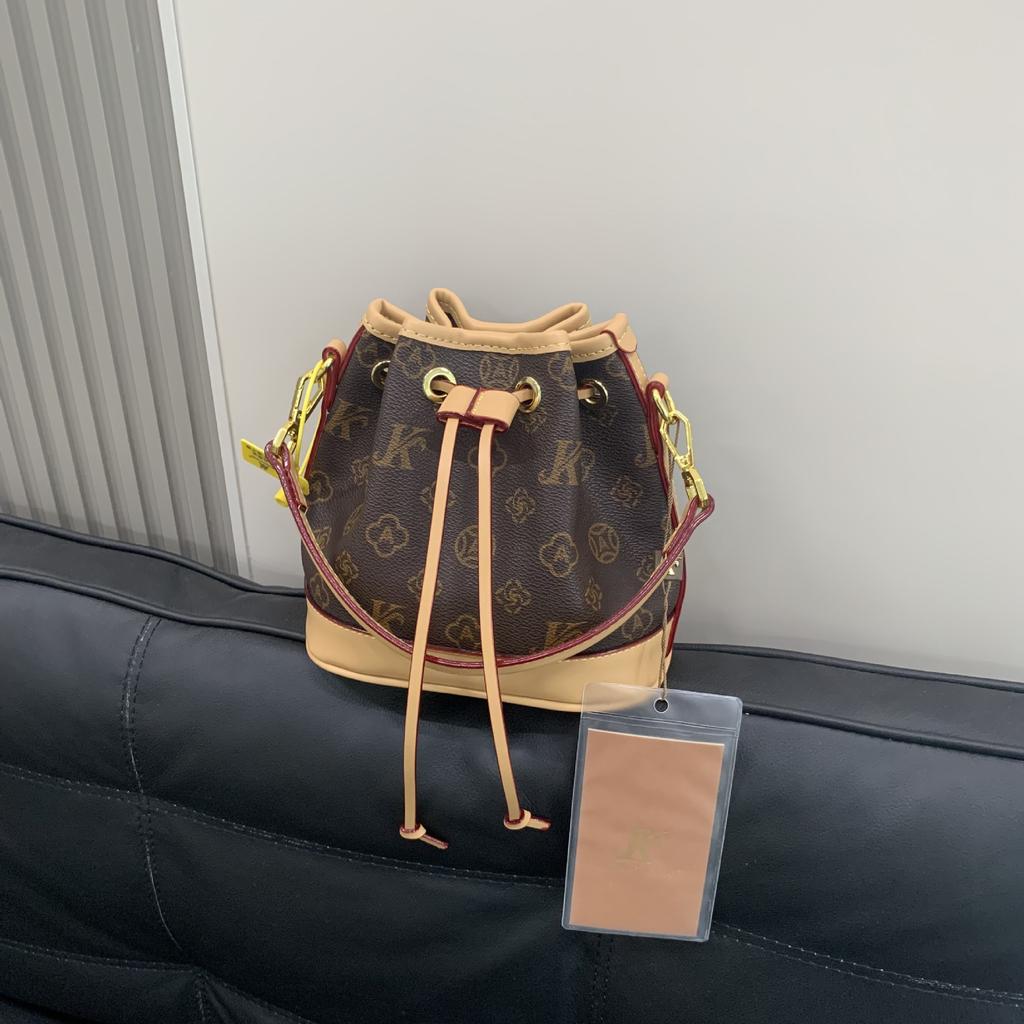 New women's bag fashion style nano bucket bag portable shoulder oblique span bag