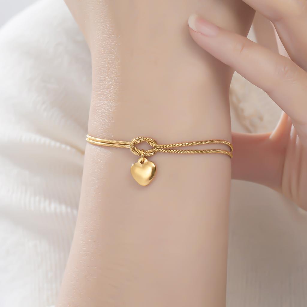 Cazador Stainless Steel Hollow Heart Charm Bracelet for Women Love Knot Snake Chain Bracelet Birthday Gift 2026 New