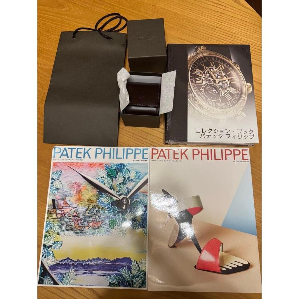 Used Patek Philippe collection book, 2 magazines, and travel case