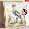This pearl painting kit features 5D pearls and a graceful crane with lotus flowers mosaic art style. designed for home wall decoration.