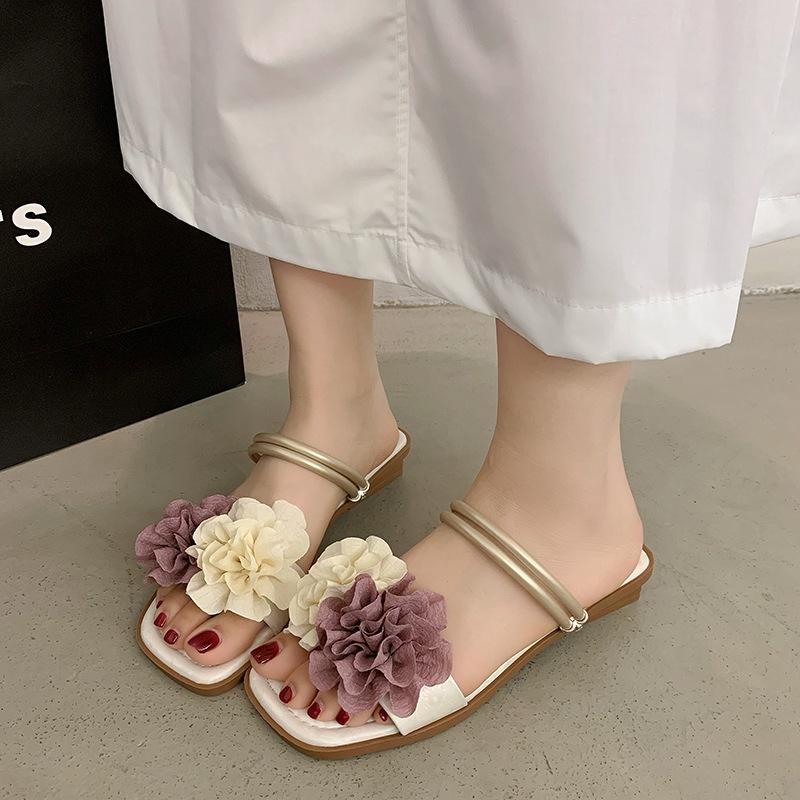 2025 spring and summer new sandals women's fashion flat slippers niche design sense casual one-word shoes