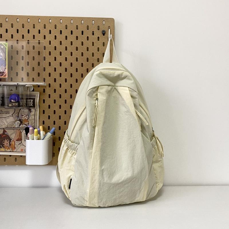 Travel lightweight advanced sense niche backpack college student commuter junior high school girls schoolbag Japanese and Korean simple backpack