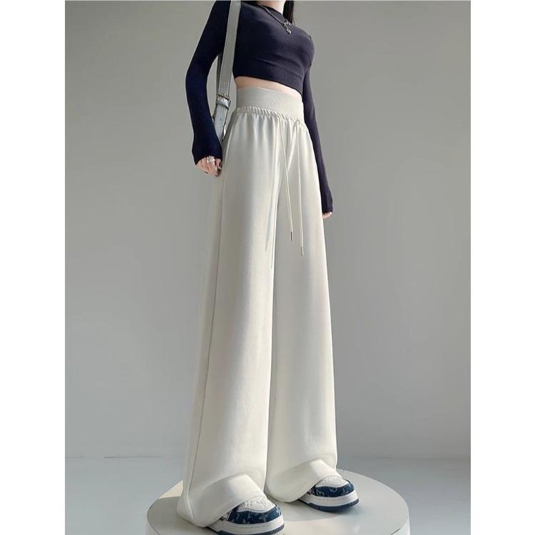 Wygodne i stylowe szare spodnie damskie w amerykańskim stylu ze sznurkiem i szerokimi nogawkami, idealne do noszenia na co dzień i do uprawiania sportu