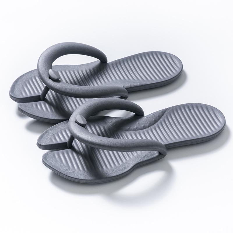 Spring and summer new product portable couple flip-flops women's home simple solid color beach travel hotel cool slippers