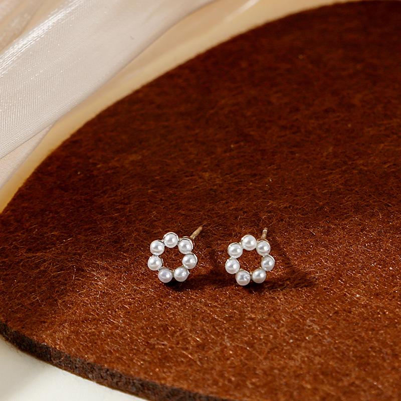 

925 silver needle pearl hollow round stud earrings Japan and Korea new small exquisite earrings Internet celebrity trend versatile earrings
