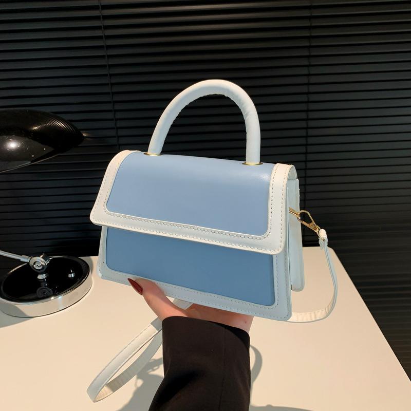 Splicing color clamshell type casual summer new simple Korean version fashionable foreign style women's hand carry shoulder small square bag soft