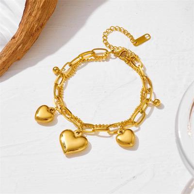Elegante Bracciale Multistrato in Acciaio Inossidabile a Forma di Cuore per Donna - Design Resistente al Colore con Cuori Doppi Color Pesca