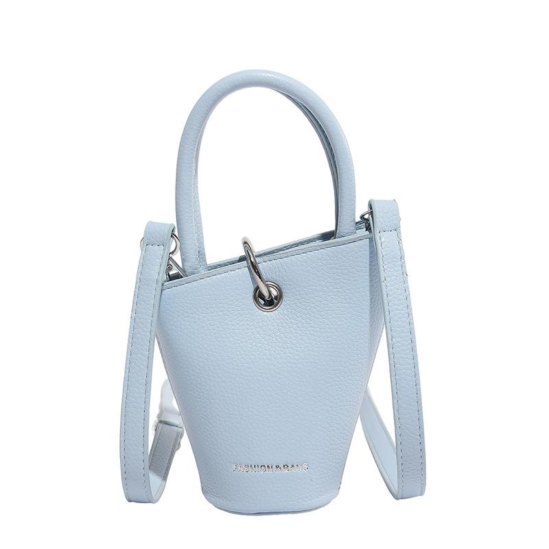 Niche design fashionable versatile hand bag women's summer new simple retro messenger bucket bag