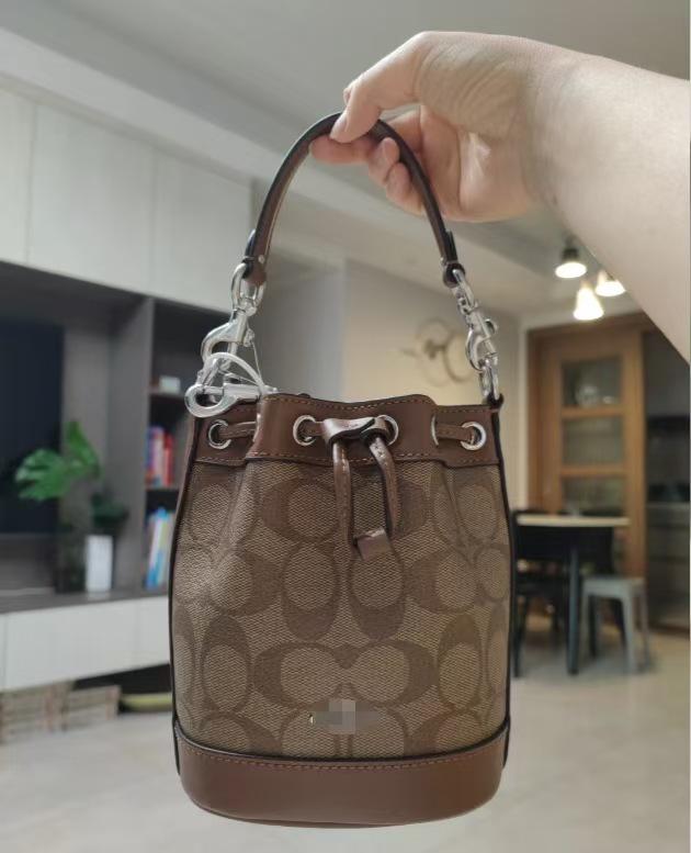 

Демпси 15 от Коуцзя: Классическая сумка-ведро на кулиске с цветочным принтом – Универсальная сумка и кроссбоди для женщин 14*9*18 cm