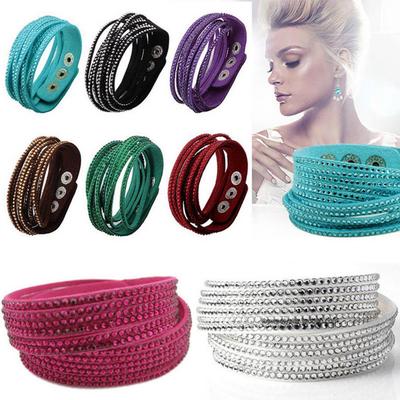 Bracciale rigido con strass punk con polsino in ecopelle multistrato alla moda