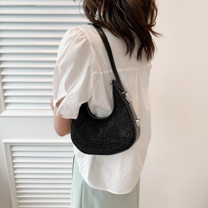 Chic Silver Crescent Bag For Women Featuring Soft Pu Material And Sleek Street Style Ideal For Daily Outfits