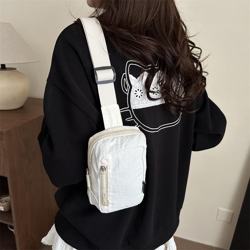 New sports go out light backpack messenger bag mobile phone bag portable fashion shoulder bag men's and women's bags