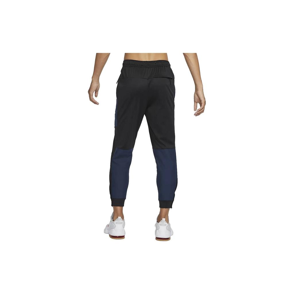 Nike Luźne zwężane joggery ze sznurkiem Męskie spodnie Czarny FB8602-010