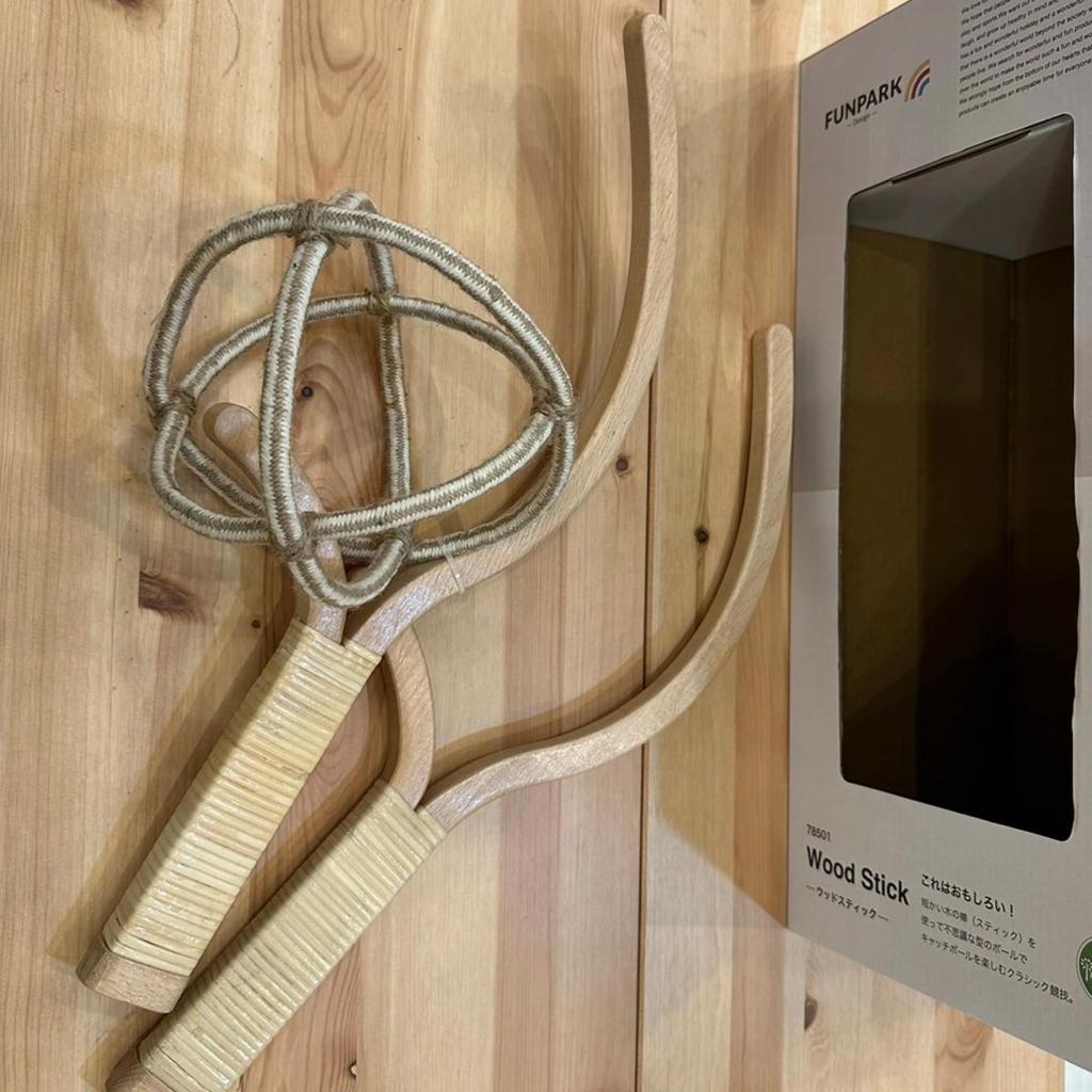 FUNPARK Wood Stick 78501, a rope ball for outdoor play, camping, picnics, and playing catch.