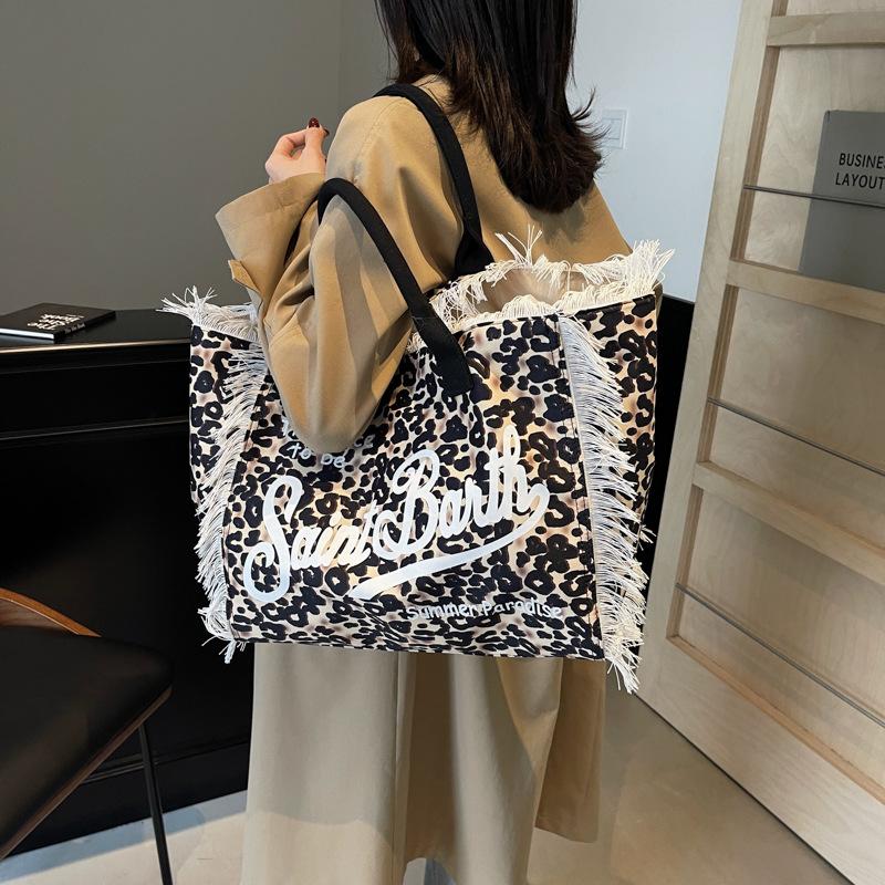 New women's large-capacity leisure travel leopard print canvas handmade fringed handbag tote bag